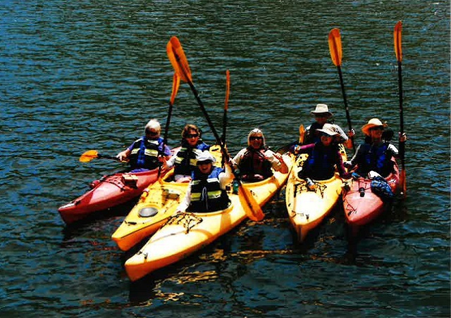 Kayaking the Duoro River in Portugal with a small group of Nat Hab travelers.