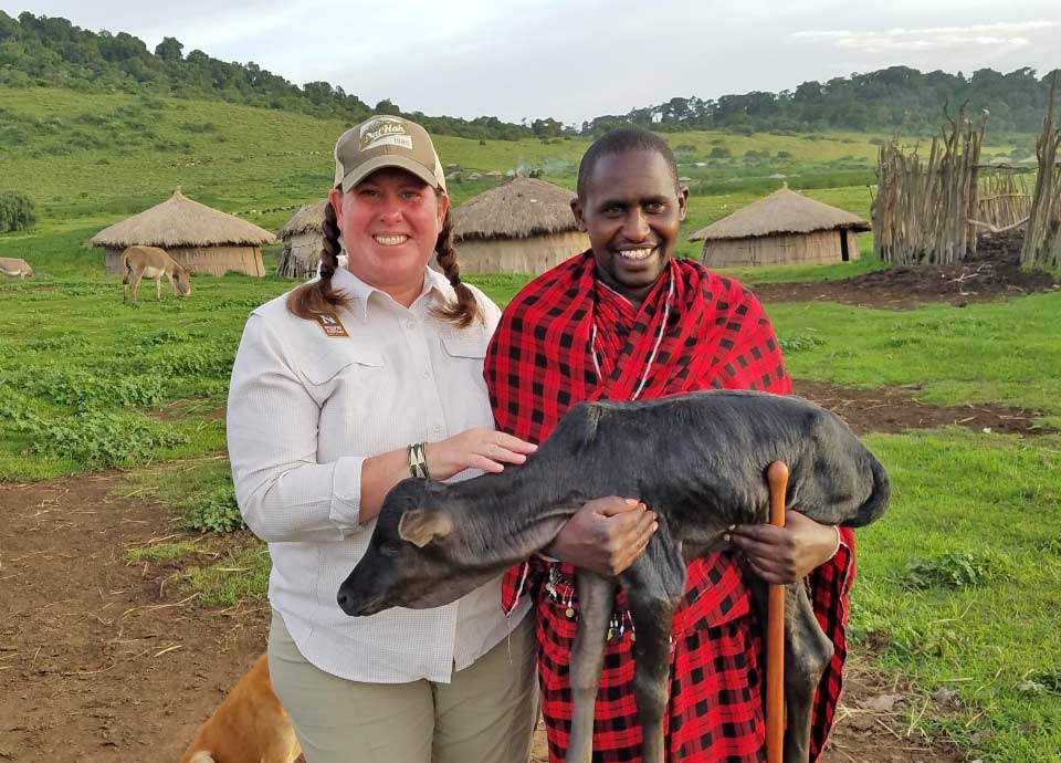 With our Maasai guide and newborn calf!